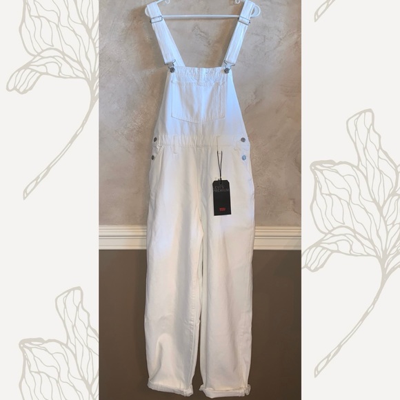 white baggy overalls